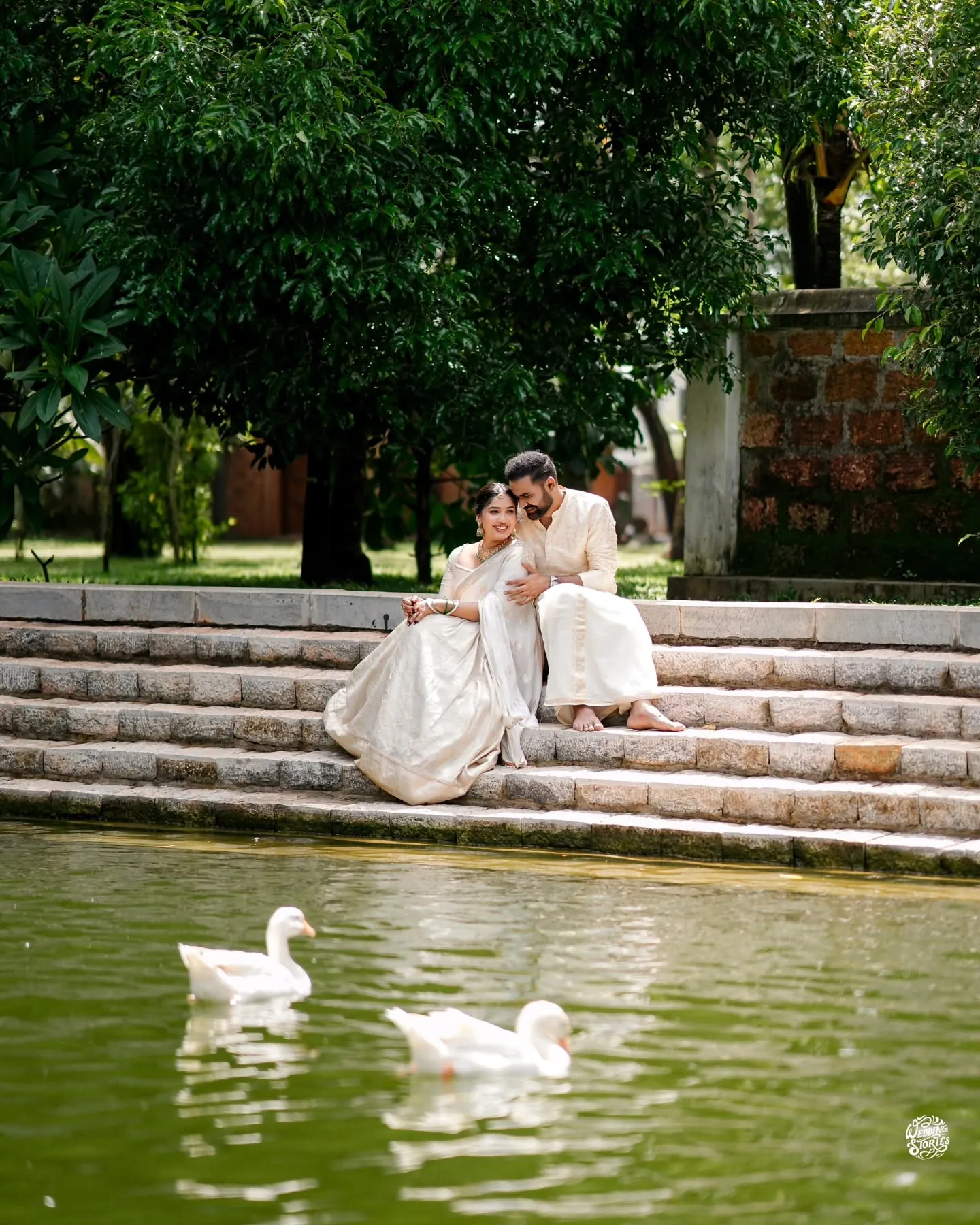 A newlywed couple sharing a playful moment during their ceremony