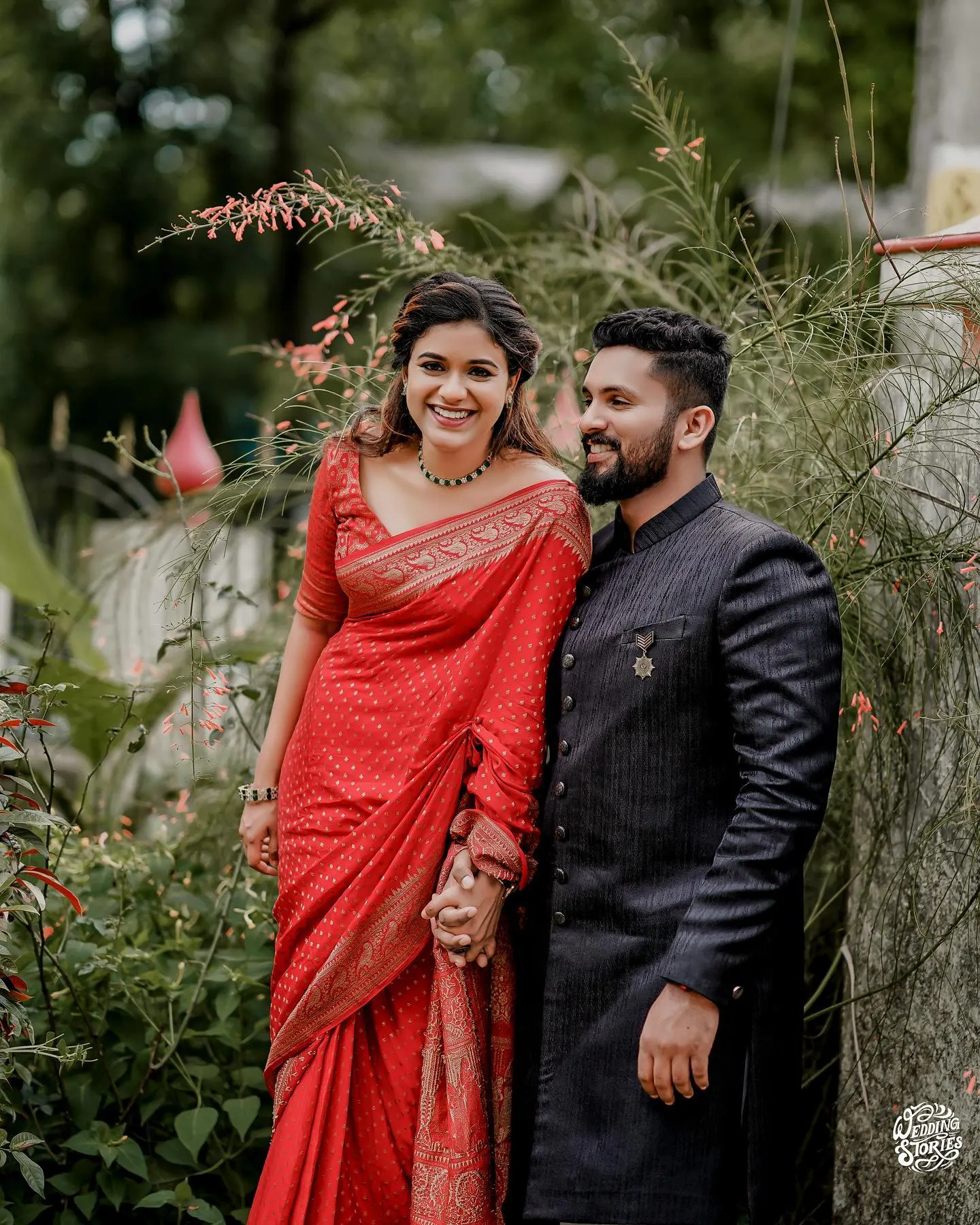 A couple in wedding attire sharing a quiet embrace